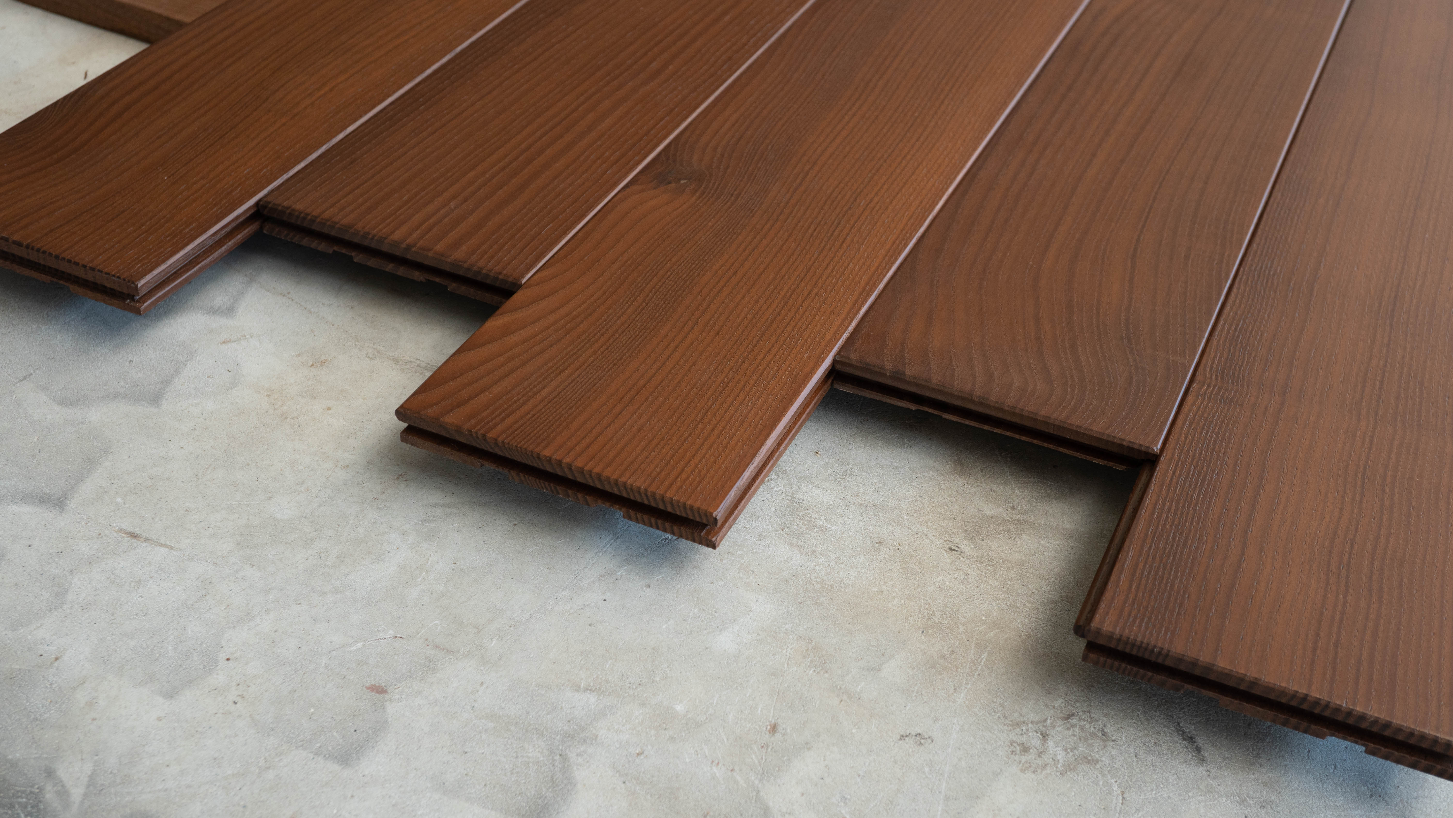 sàn gỗ biến tính VASACO VTP6003X trong nhà gỗ tần bì